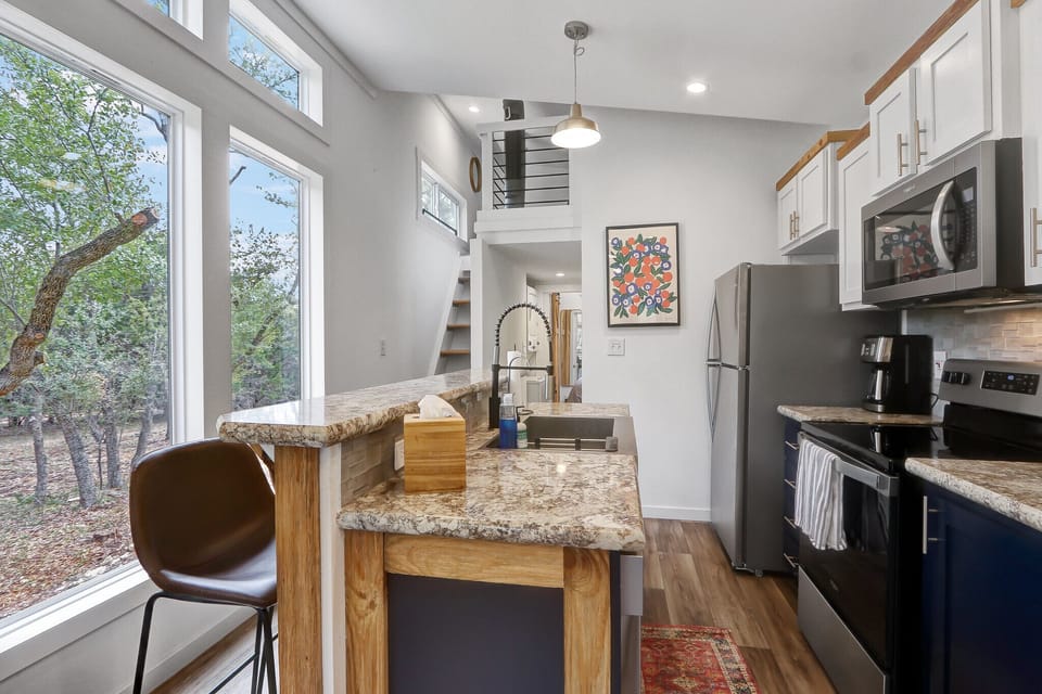 View looking into the kitchen from the living area/entrance.