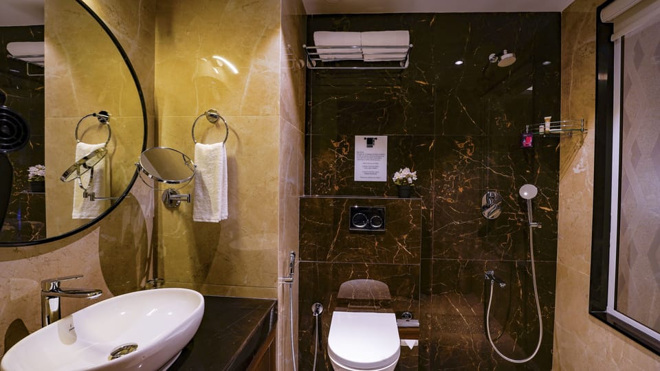 Premium Double Room | Bathroom | Shower, hair dryer, towels, soap