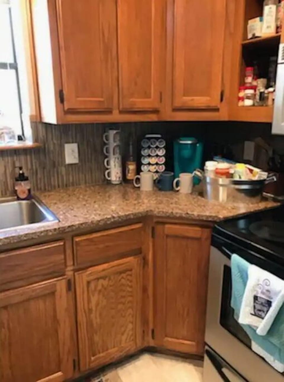Coffee bar area. Keurig w/ K-cups. Mugs, and another 8 cup stainless steel pot