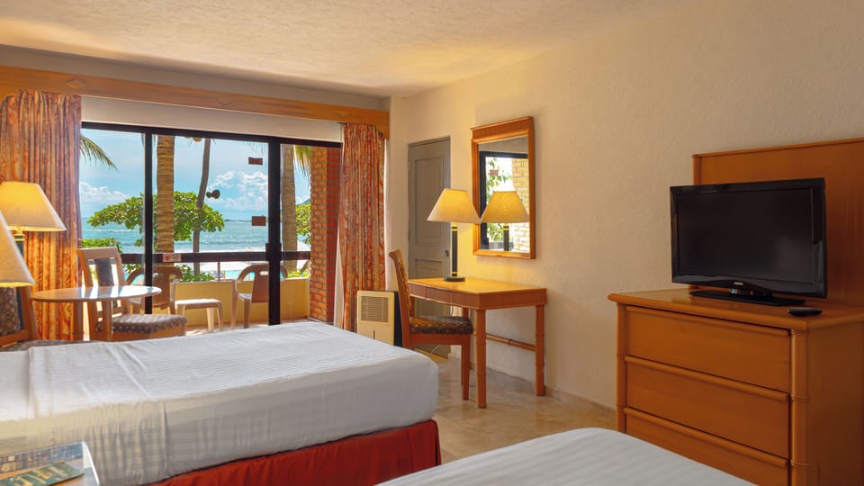 Standard Room, 2 Double Beds, Ocean View | Beach/ocean view