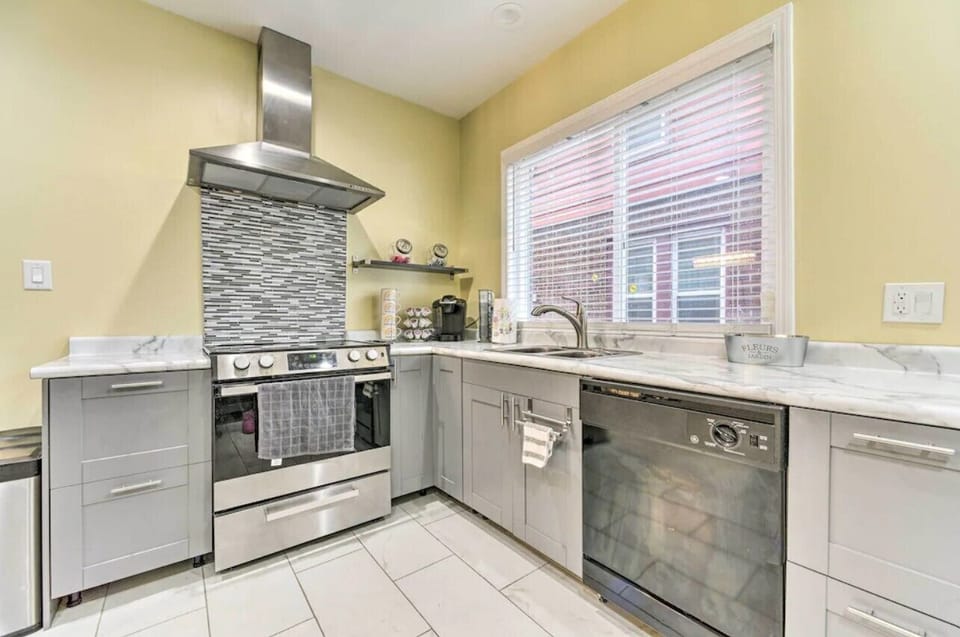 Full kitchen view with modern appliances and breakfast nook