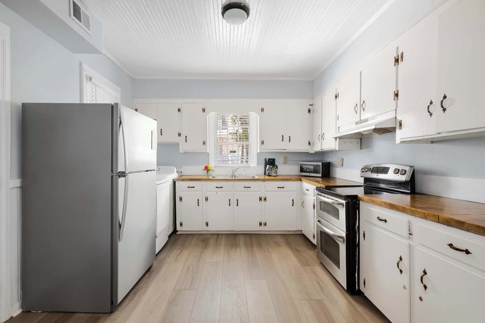 Kitchen with needed cooking supplies 