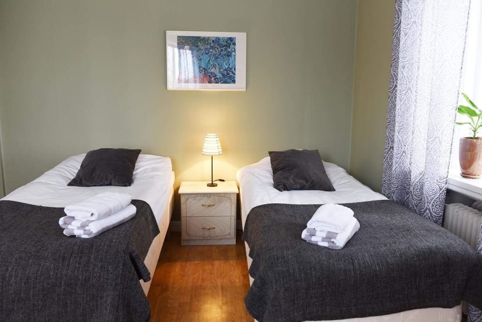 Desk, laptop workspace, free WiFi, bed sheets
