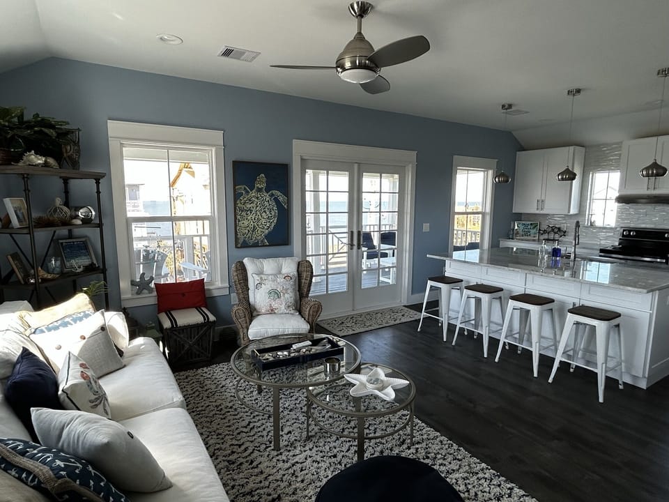 Relax at the counter or in the seating area across from open kitchen.