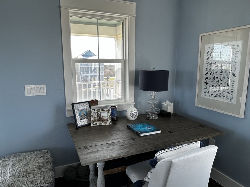 If work arises, a desk is available to tackle the job while taking in the view.