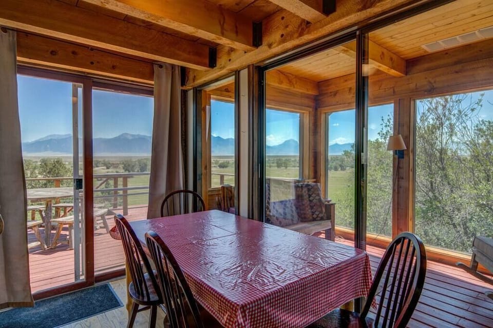 View of the dining area and sunroom! 