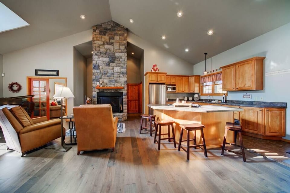 The chef is not left out of the activity with the open concept living and dining area. 