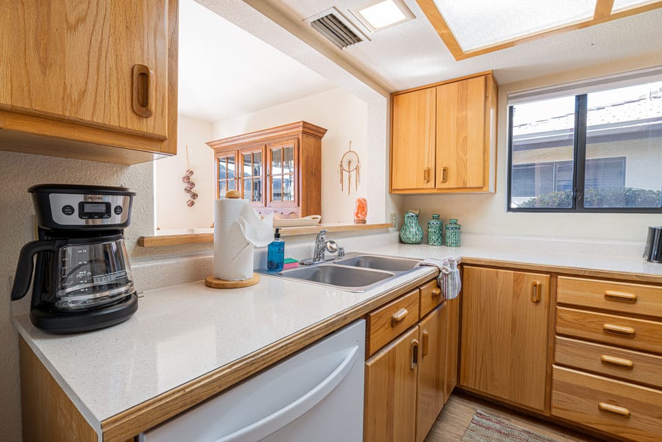 Fully Equipped Kitchen Opens To Dining Room