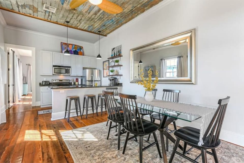 Dining room table and counter have ample seating