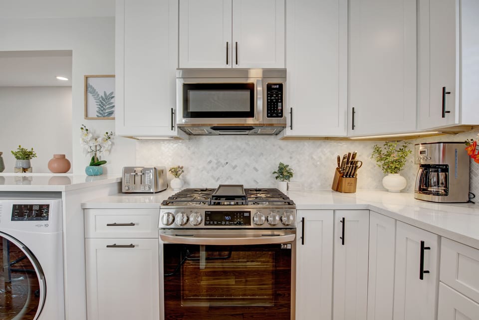 Fully stocked kitchen with brand new appliances.