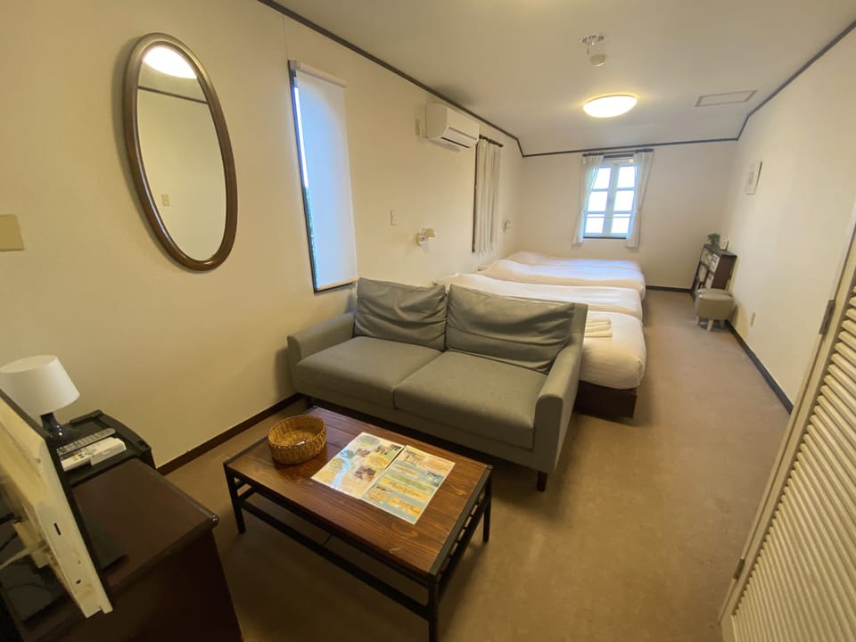 Deluxe Triple Room, 3 Twin Beds, Ocean View | Free WiFi, bed sheets