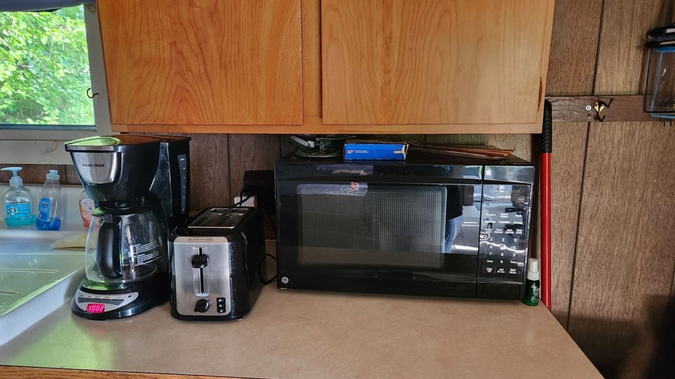 microwave, toaster, coffee pot