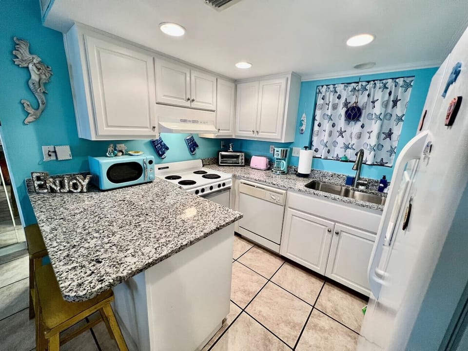 Fully Stocked, Eat-In Kitchen with Drip Coffee Maker