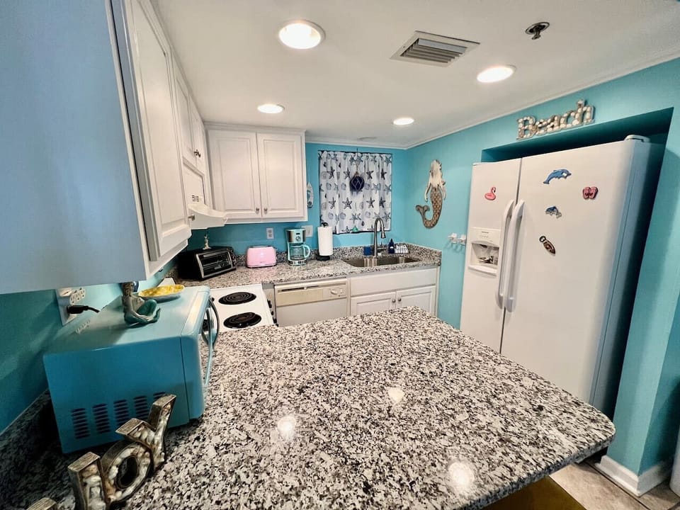 Fully Stocked, Eat-In Kitchen with Drip Coffee Maker