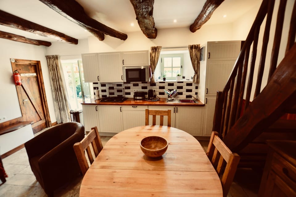 Fully fitted kitchen and table for four.