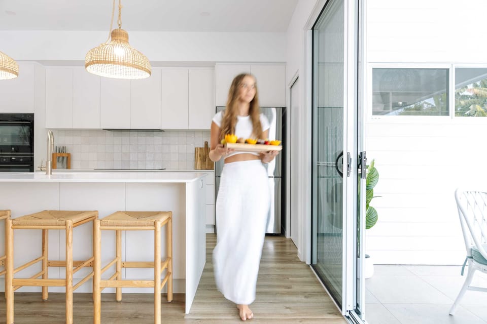 Utilise the modern kitchen to cook for family and friends.