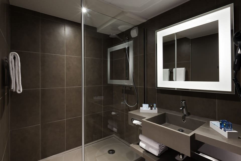 Eco-friendly toiletries, hair dryer, towels, soap