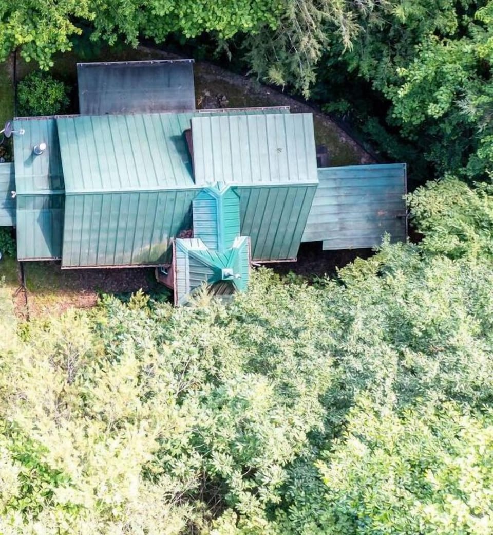 Surround Yourself in the Beauty of Nature at the 2 Acre Wooded Retreat