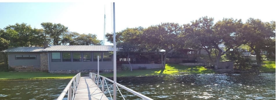 View of LakeHouse from covered deep water boat dock