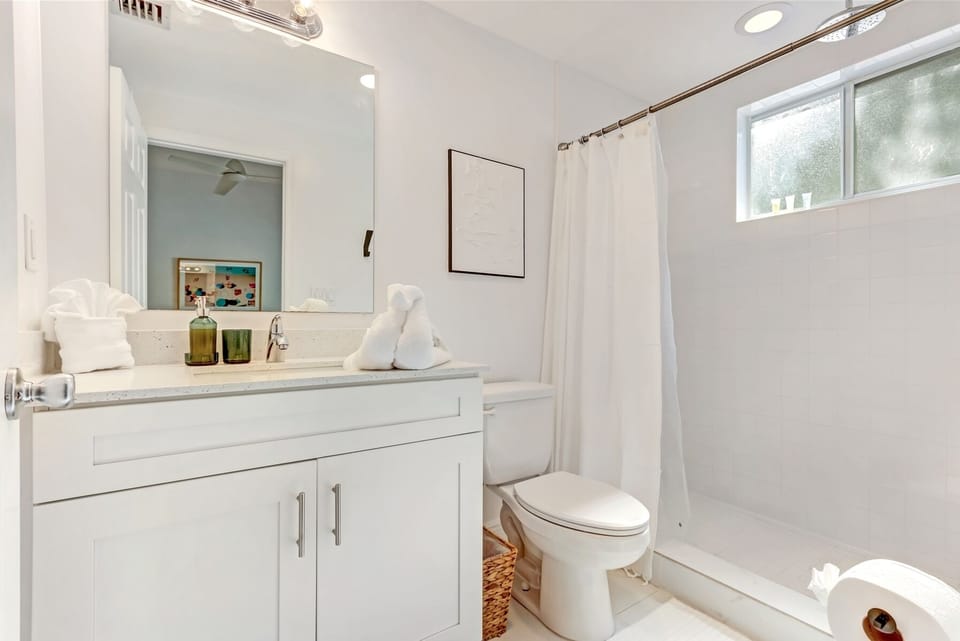 Full-bathroom stocked with necessities