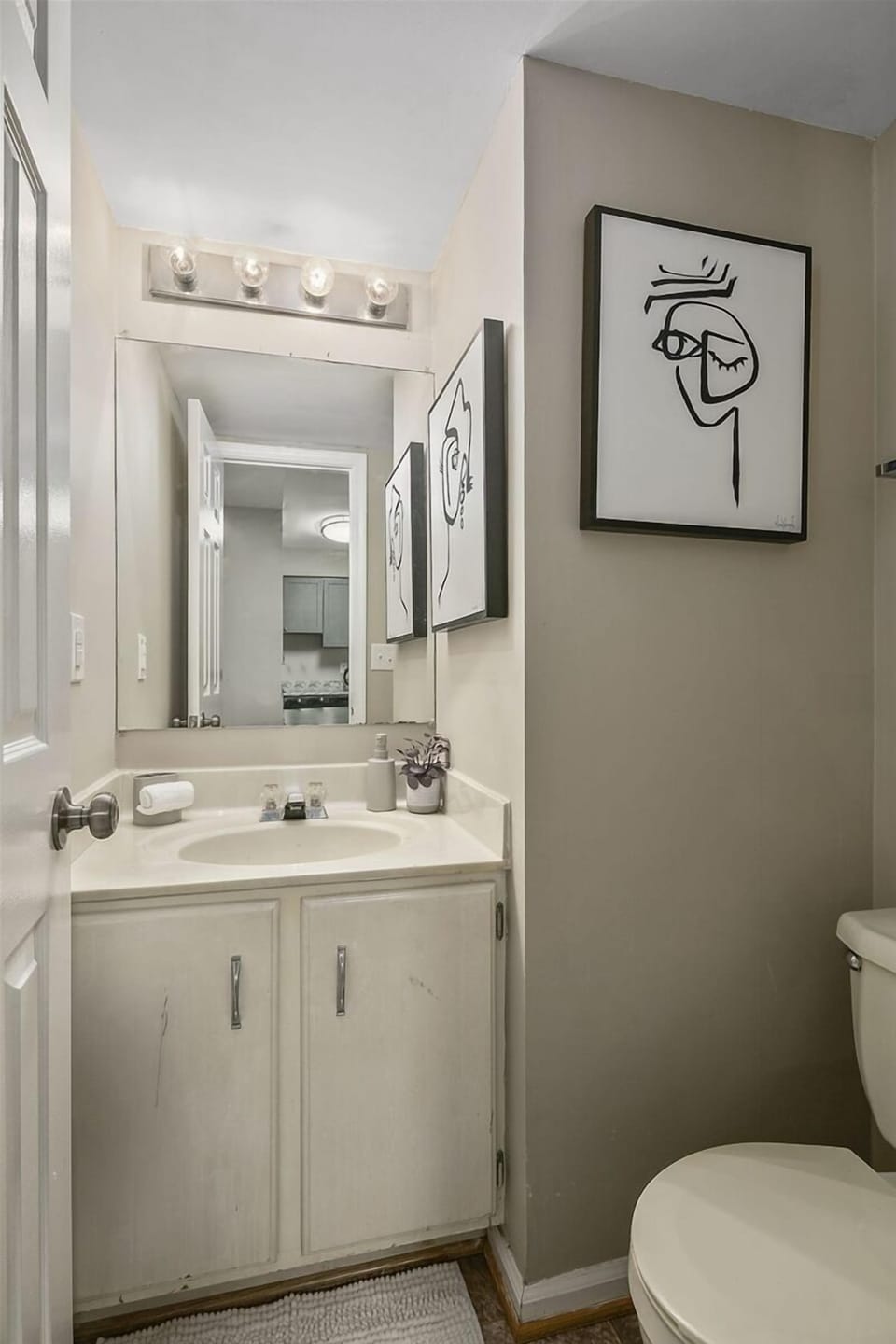 Convenient, main-floor powder room, complete with essentials