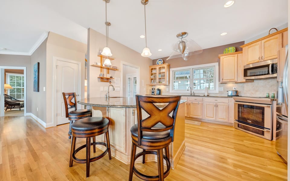 Spacious kitchen, granite countertops, and top quality appliances.