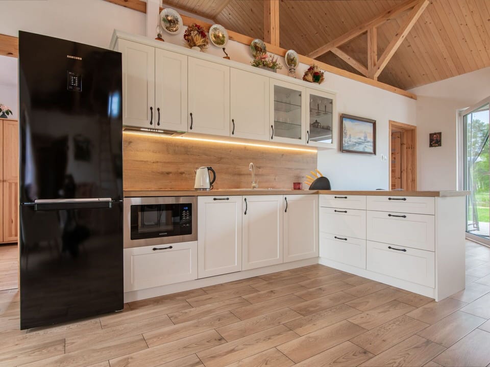 Flooring, Cabinetry, Kitchen, Countertop, Furniture, Interior Design, Wood, Kitchen Appliance, Floor, Wood Flooring
