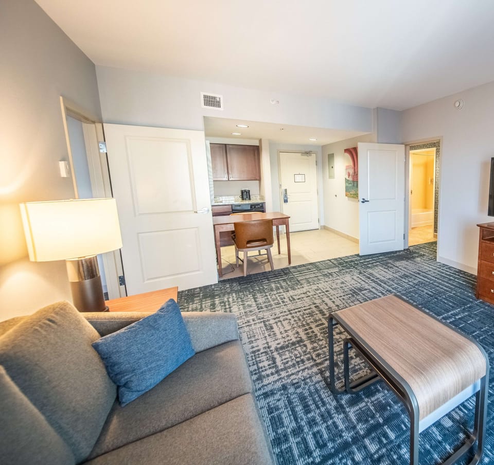 Suite, 2 Bedrooms | Living area | 42-inch flat-screen TV with premium channels, TV