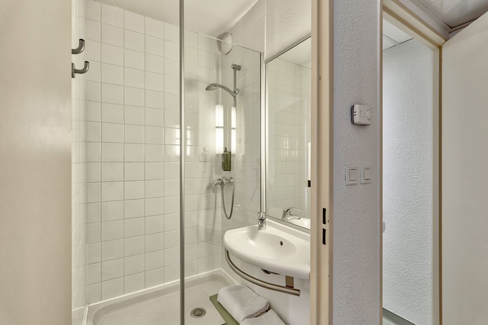 Shower, towels, soap, shampoo