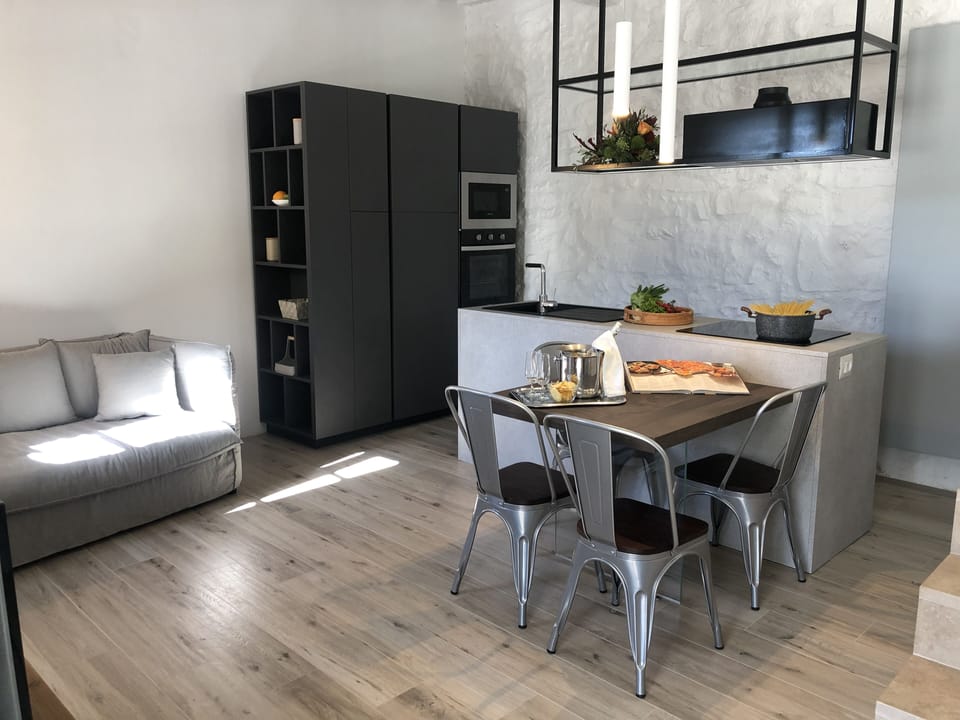 Luxury Apartment | Living area | Flat-screen TV