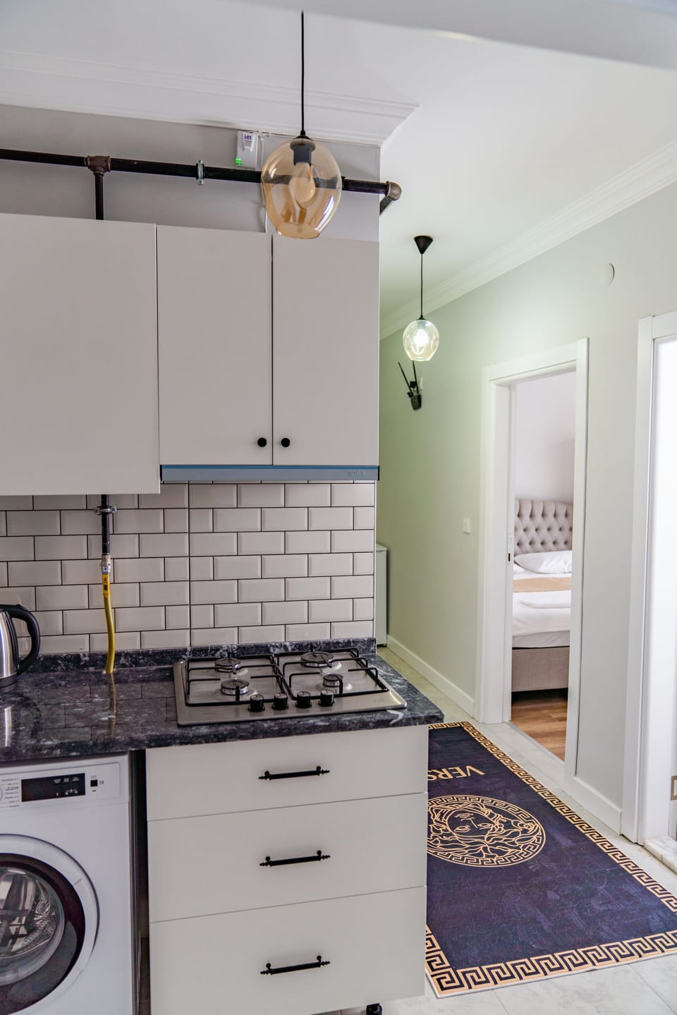 Mini-fridge, stovetop, griddle, cookware/dishes/utensils