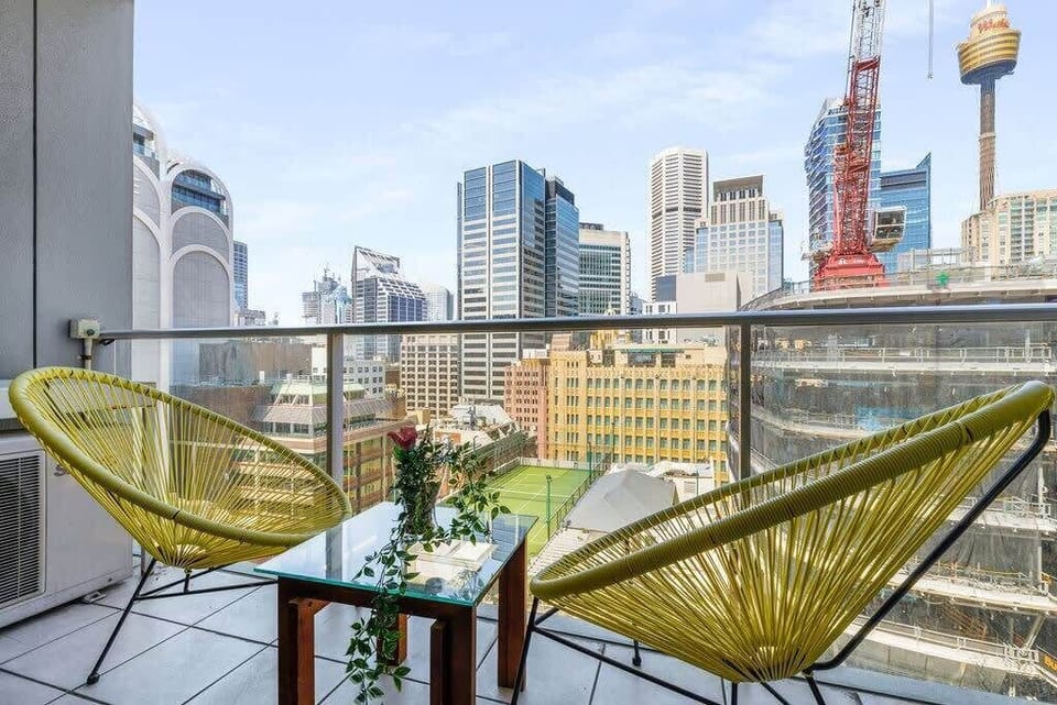 A balcony with city views.