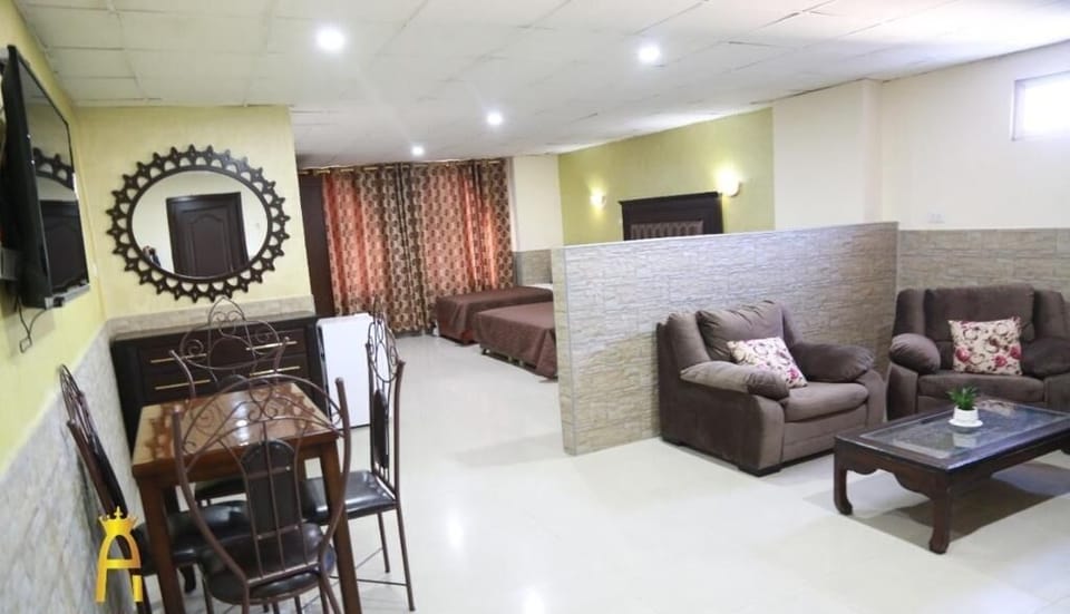 Deluxe Quadruple Room, 1 Bedroom, City View | WiFi (free), bed sheets