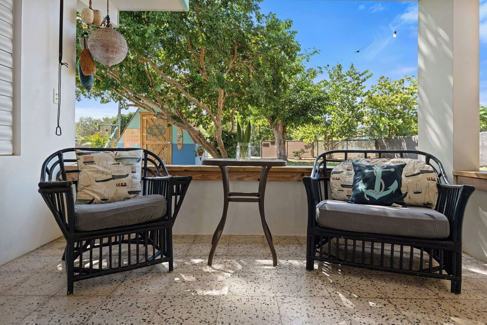Sip coffee while soaking up the tropical vibes in this inviting space!