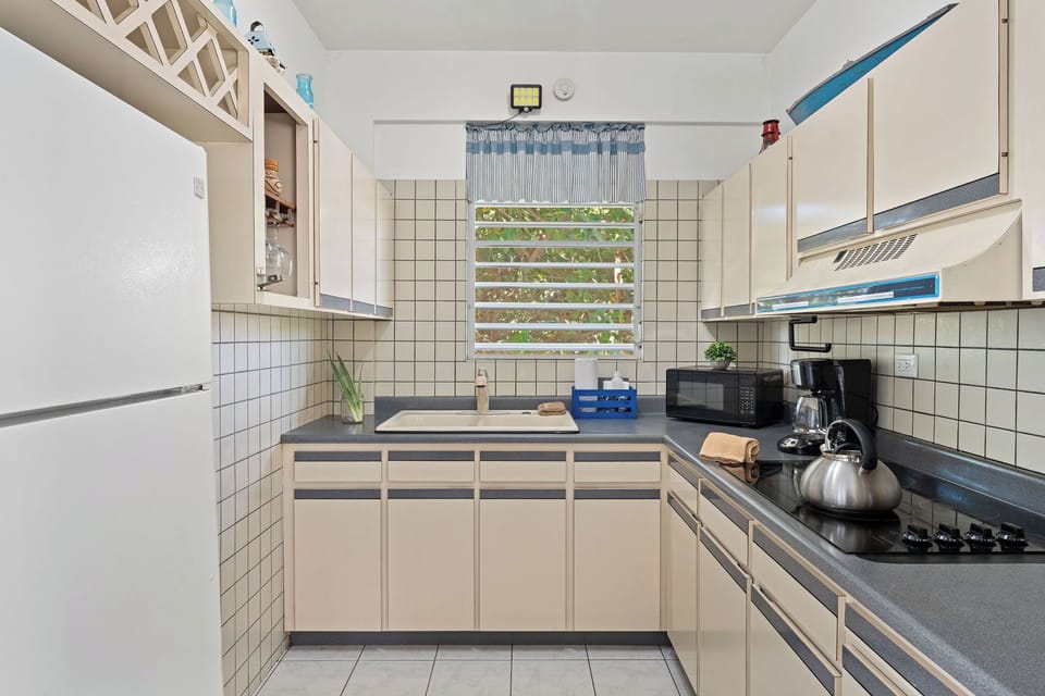 Kitchen: Bright, well-equipped space with fresh views and modern amenities!