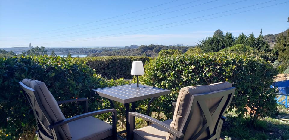 The private patio off of bedroom three is a great spot to have morning coffee.