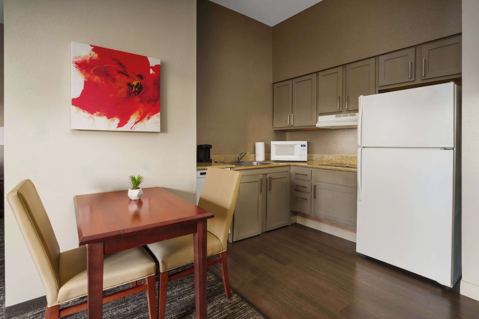 Premium bedding, pillowtop beds, desk, laptop workspace