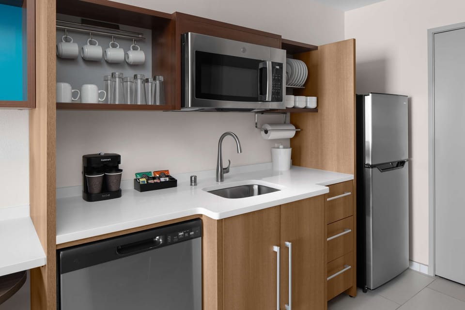 Espresso maker, coffee/tea maker, full-size fridge, microwave