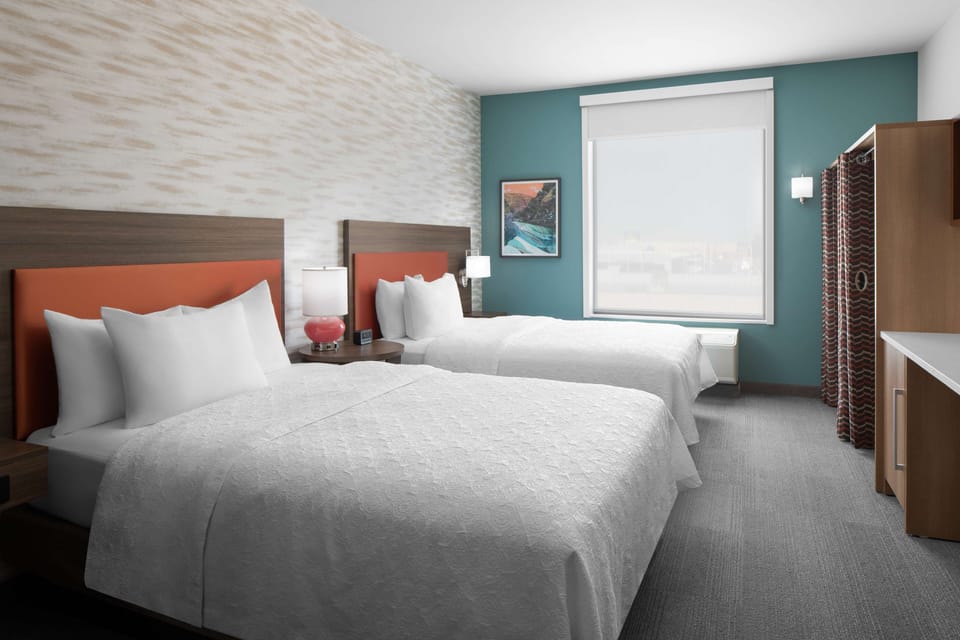 Premium bedding, down comforters, desk, laptop workspace