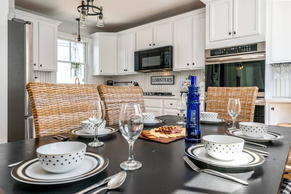 Have a family meal and local wine in this updated kitchen with a harbor view from the sink's window.