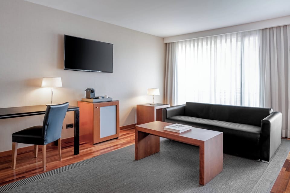 Suite, 1 King Bed with Sofa bed | Minibar, in-room safe, desk, blackout drapes