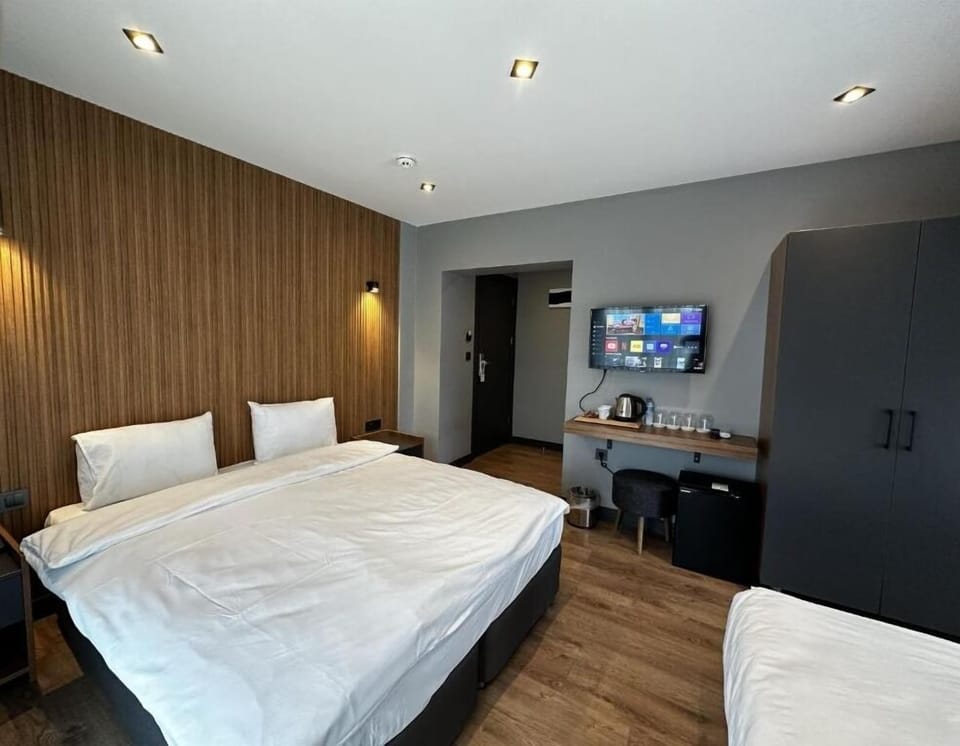 Family Quadruple Room | Egyptian cotton sheets, premium bedding, memory foam beds, minibar