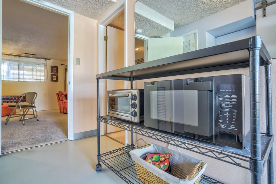 Kitchen with toaster oven, microwave, 2 burner hot plate and an outdoor BBQ