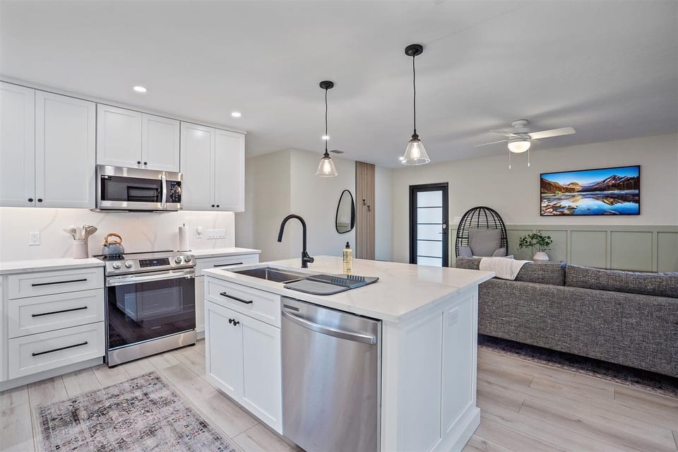 All state of the art appliances provided such as microwave, stove, oven, dishwasher, toaster, coffee maker maker, etc. (The furniture in the living have been changed from this photo)