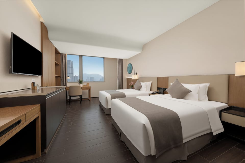 Standard Twin Room | Down comforters, pillowtop beds, desk, laptop workspace