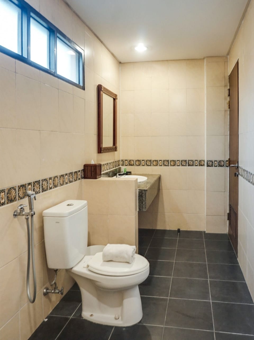 Shower, rainfall showerhead, towels, toilet paper