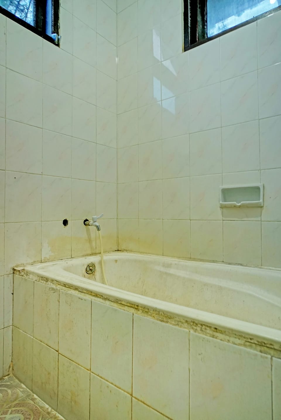 Shower, rainfall showerhead, towels, toilet paper