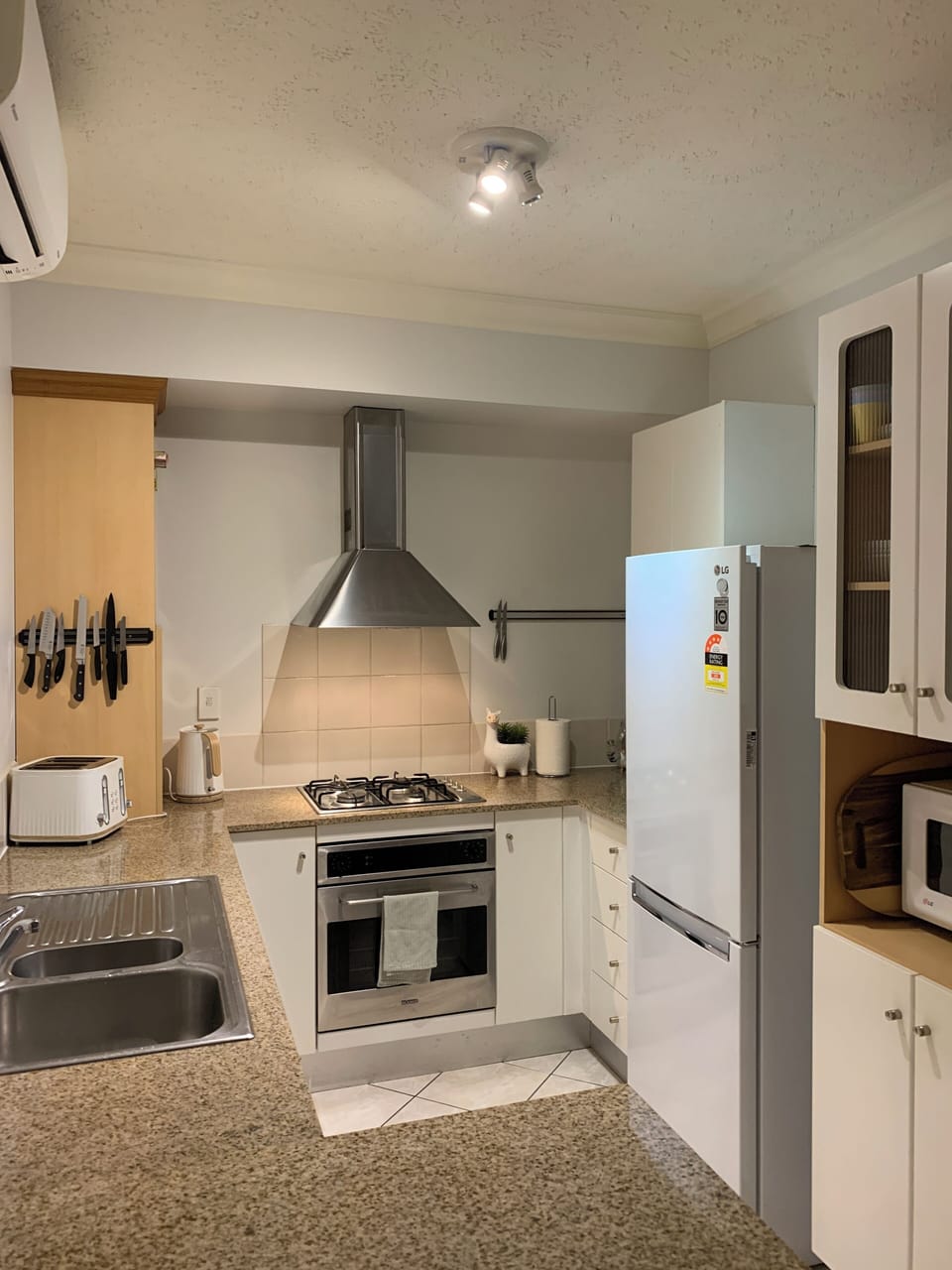 Family Room, 2 Bedrooms | Private kitchen | Full-size fridge, microwave, oven, stovetop