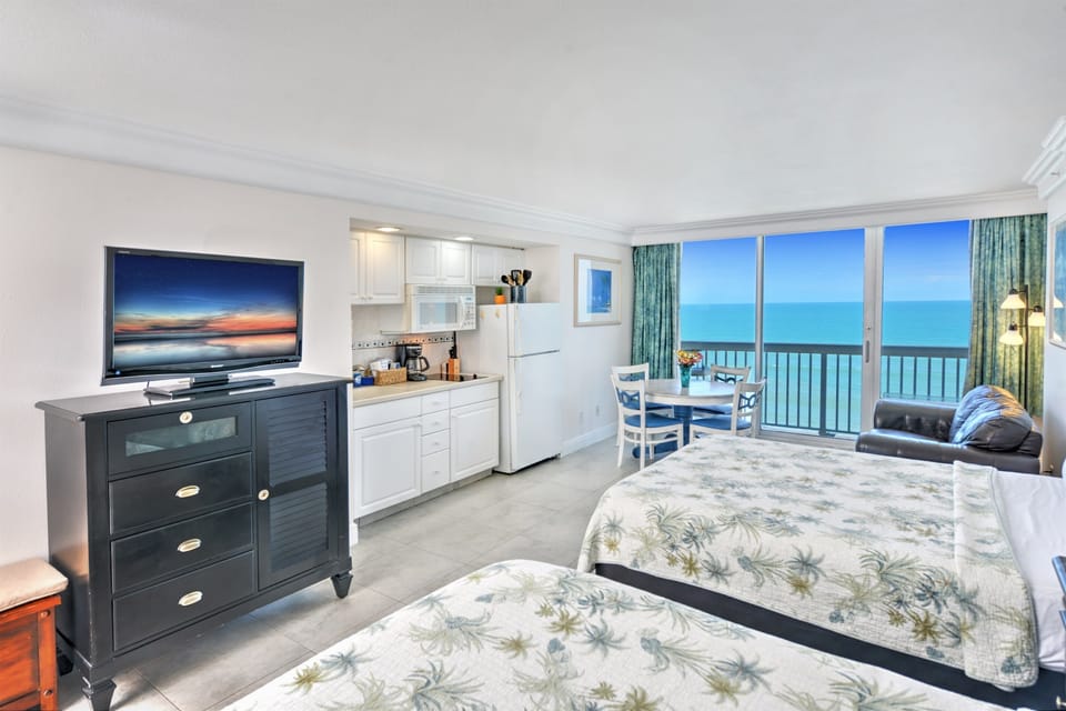 Open studio living space with ocean views - what a stunning view. 💘