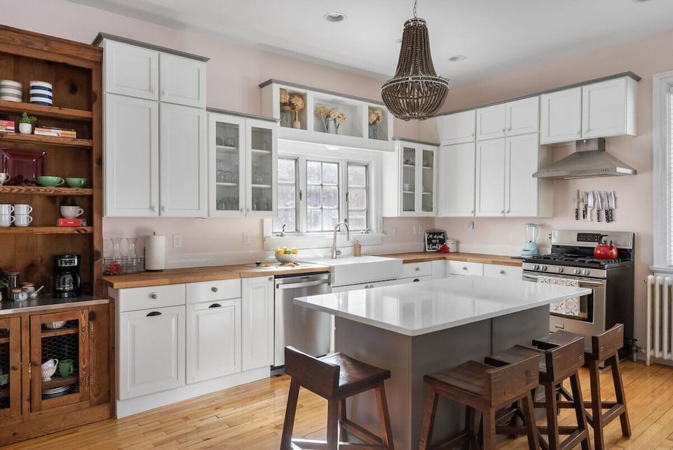 Lovely, modern kitchen with gas range and plenty of cookware and dishes for a gathering of 10 to dine together.